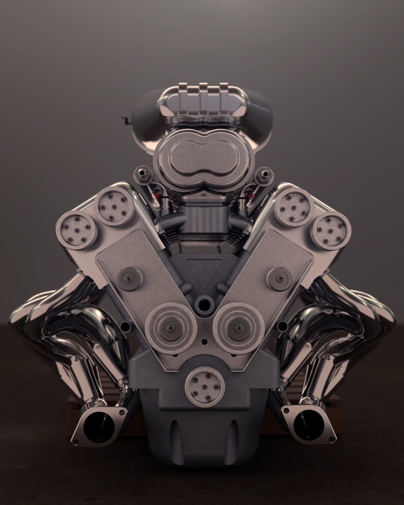 Cinematic front view of the V12 engine showing chrome headers